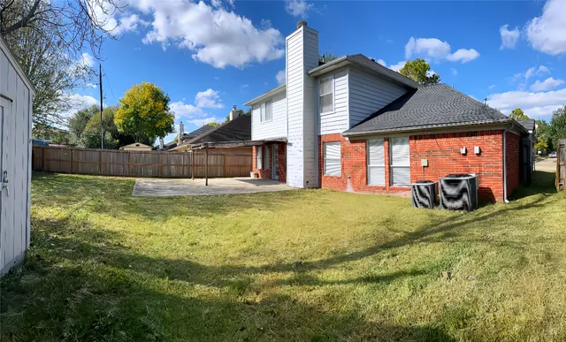 a swimming pool with some trees in the background