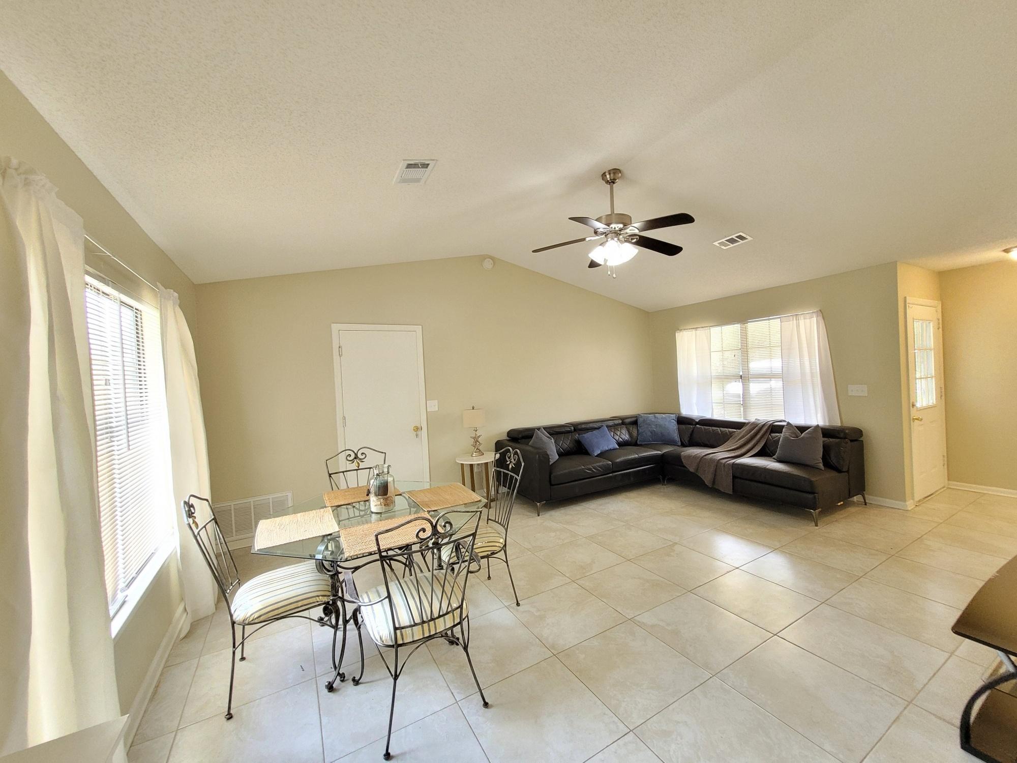 4 Holly Road Crestview, FL 32539 - Photo 13 of 30 a view of a livingroom with furniture and a window