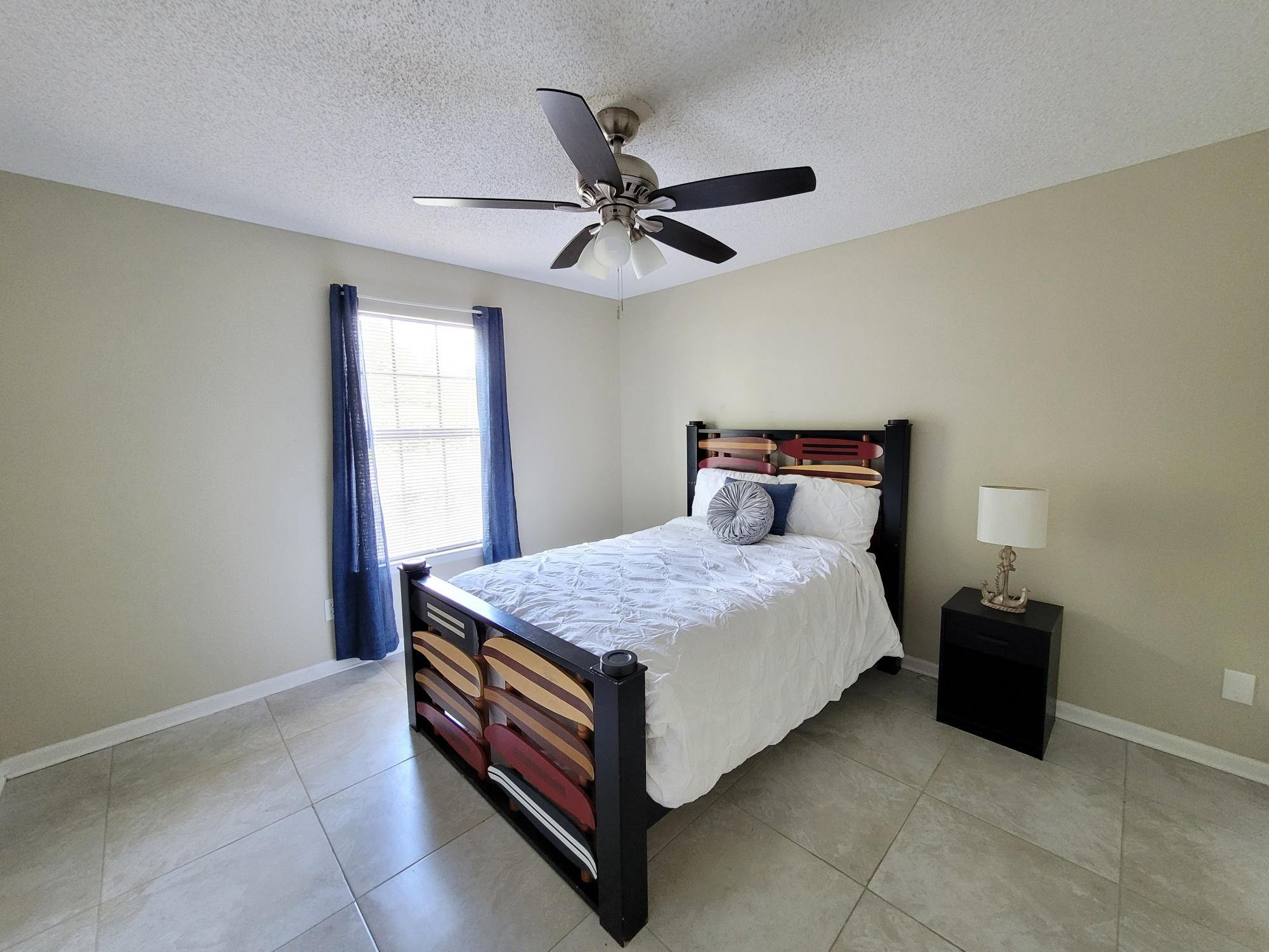 4 Holly Road Crestview, FL 32539 - Photo 20 of 30 a bedroom with a bed and window