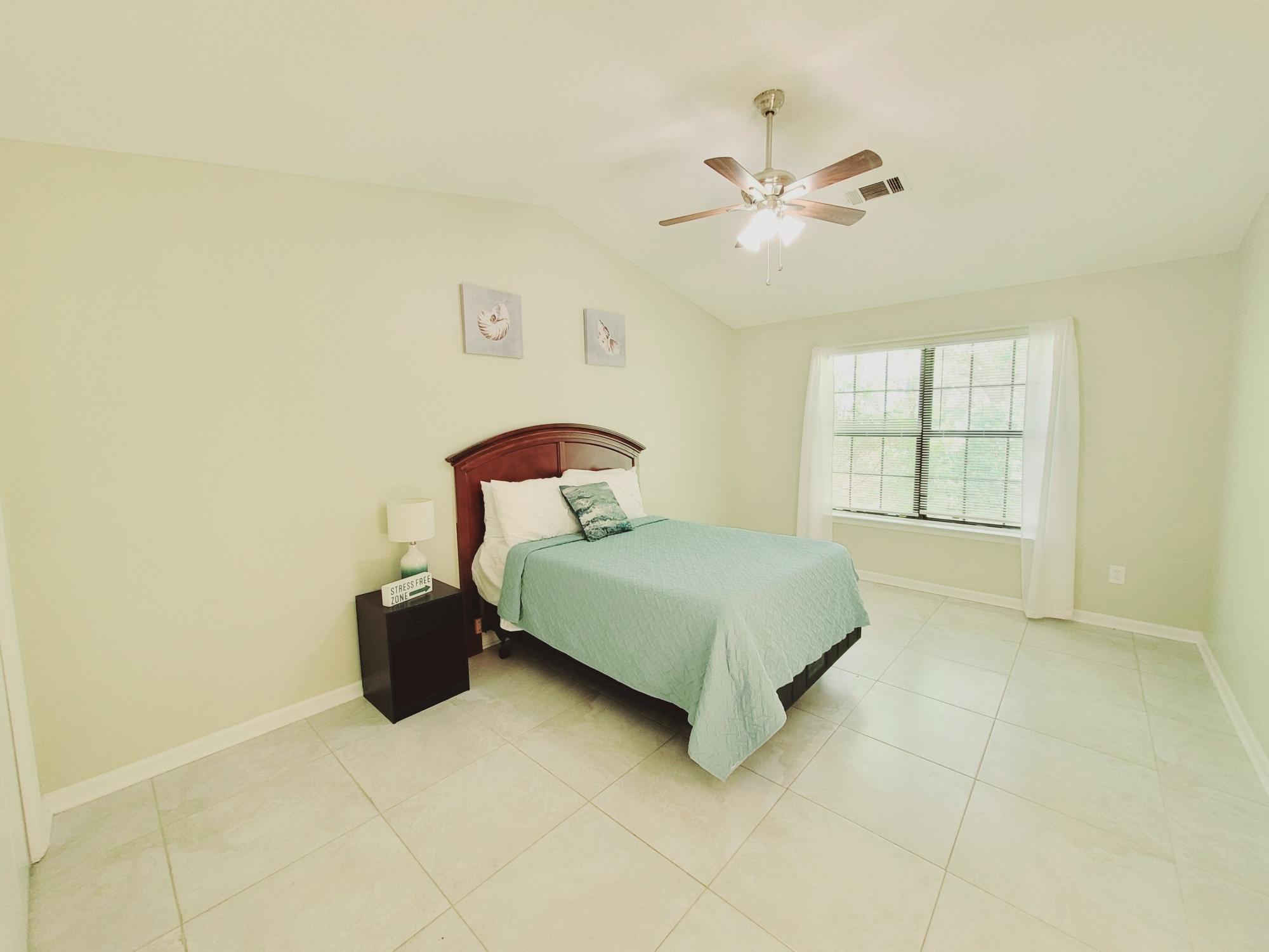 4 Holly Road Crestview, FL 32539 - Photo 23 of 30 a bedroom with a bed and a window