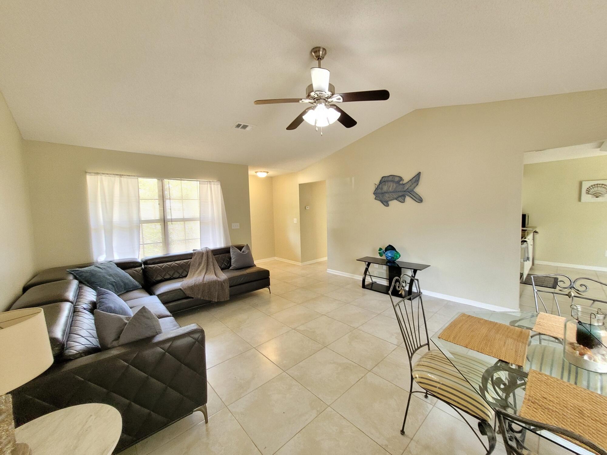 4 Holly Road Crestview, FL 32539 - Photo 8 of 30 a living room with furniture and a large window