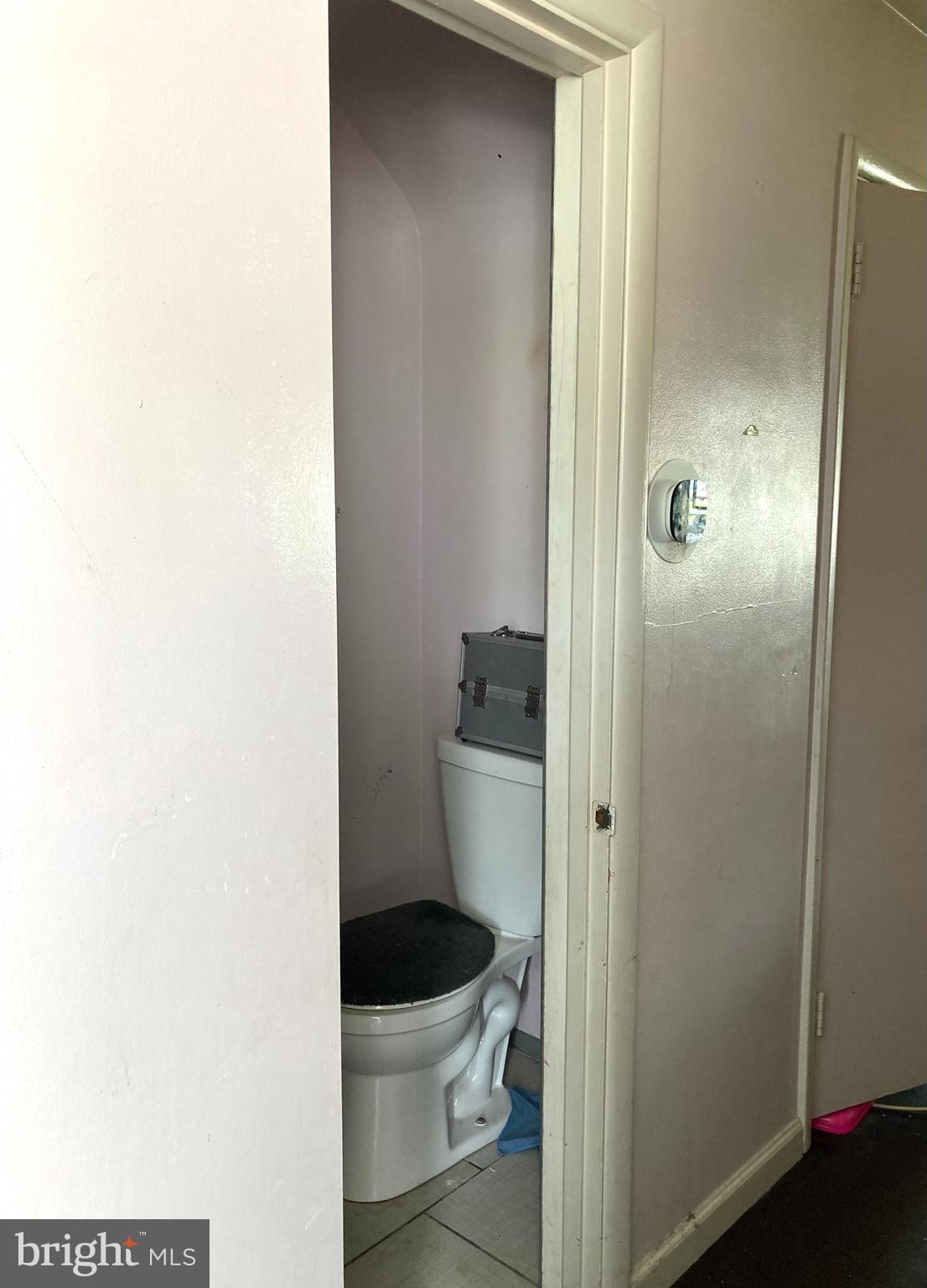 4209 Crest Heights Road Baltimore, MD 21215 - Photo 13 of 43 Main level Half Bathroom