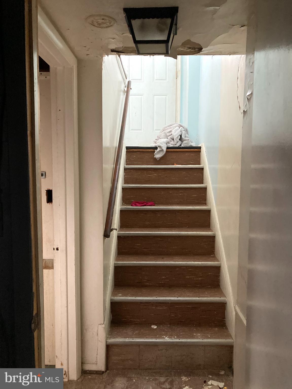 4209 Crest Heights Road Baltimore, MD 21215 - Photo 38 of 43 Basement Stairs Looking up