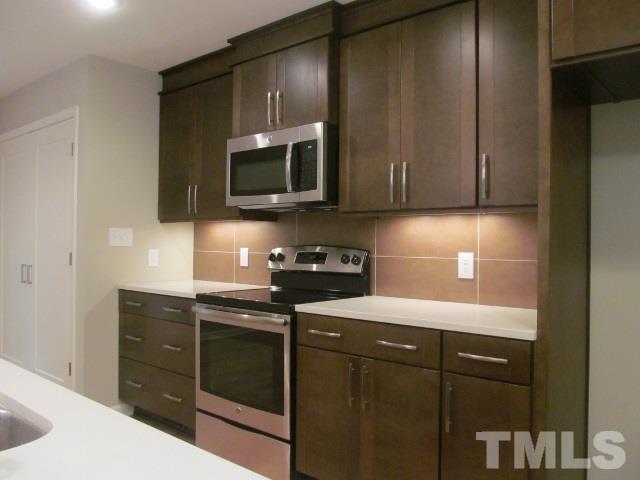 4003 Hope Valley Road Durham, NC 27707 - Photo 6 of 20 This kitchen has new maple cabinets with soft touch drawers.