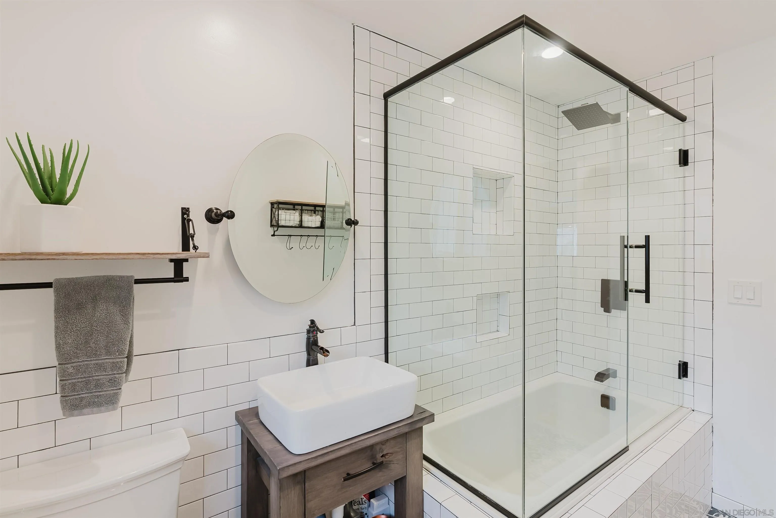 11911 Rocoso Road Lakeside, CA 92040 - Photo 19 of 32 a bathroom with a shower and a sink