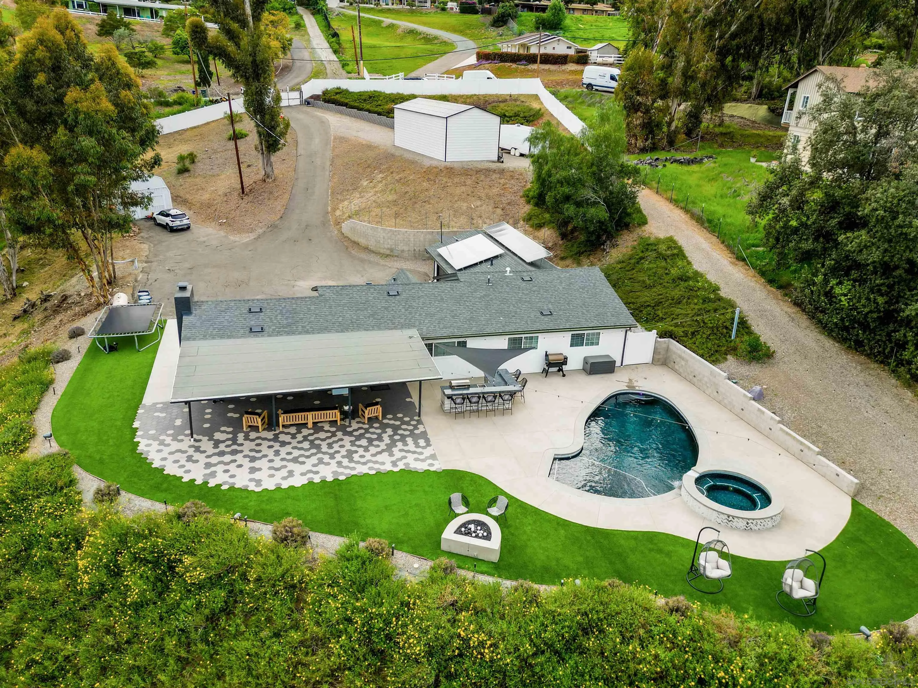 11911 Rocoso Road Lakeside, CA 92040 - Photo 2 of 32 an aerial view of a house with yard