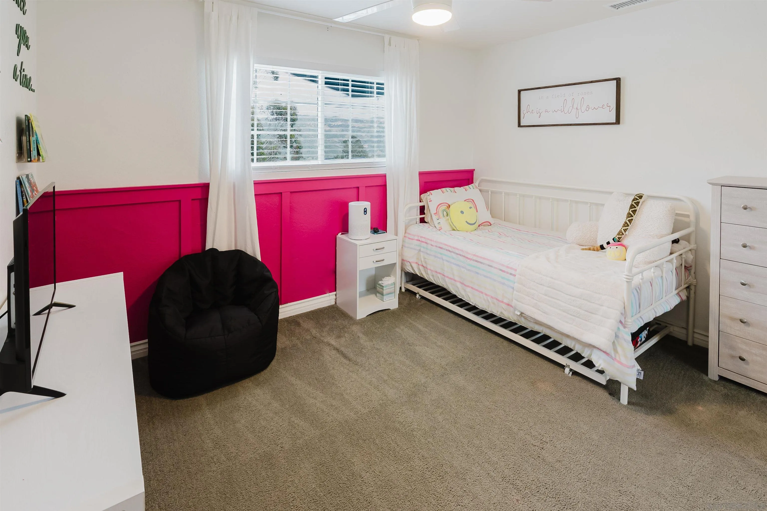 11911 Rocoso Road Lakeside, CA 92040 - Photo 22 of 32 a bedroom with a bed and window