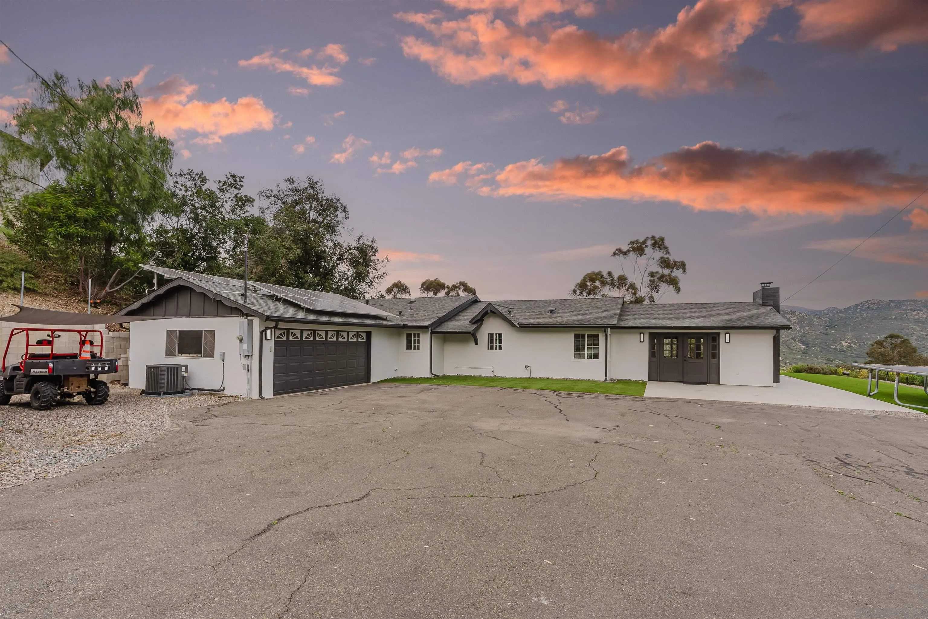 11911 Rocoso Road Lakeside, CA 92040 - Photo 25 of 32 a view of a house with a patio