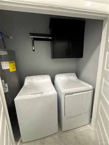 a bathroom with a sink toilet a mirror and shower