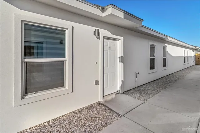 a view of a back yard of the house