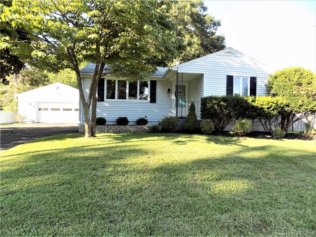 16 Robbin Road Enfield, CT 06082 - Photo 1 of 1 a view of a house with a yard and plants