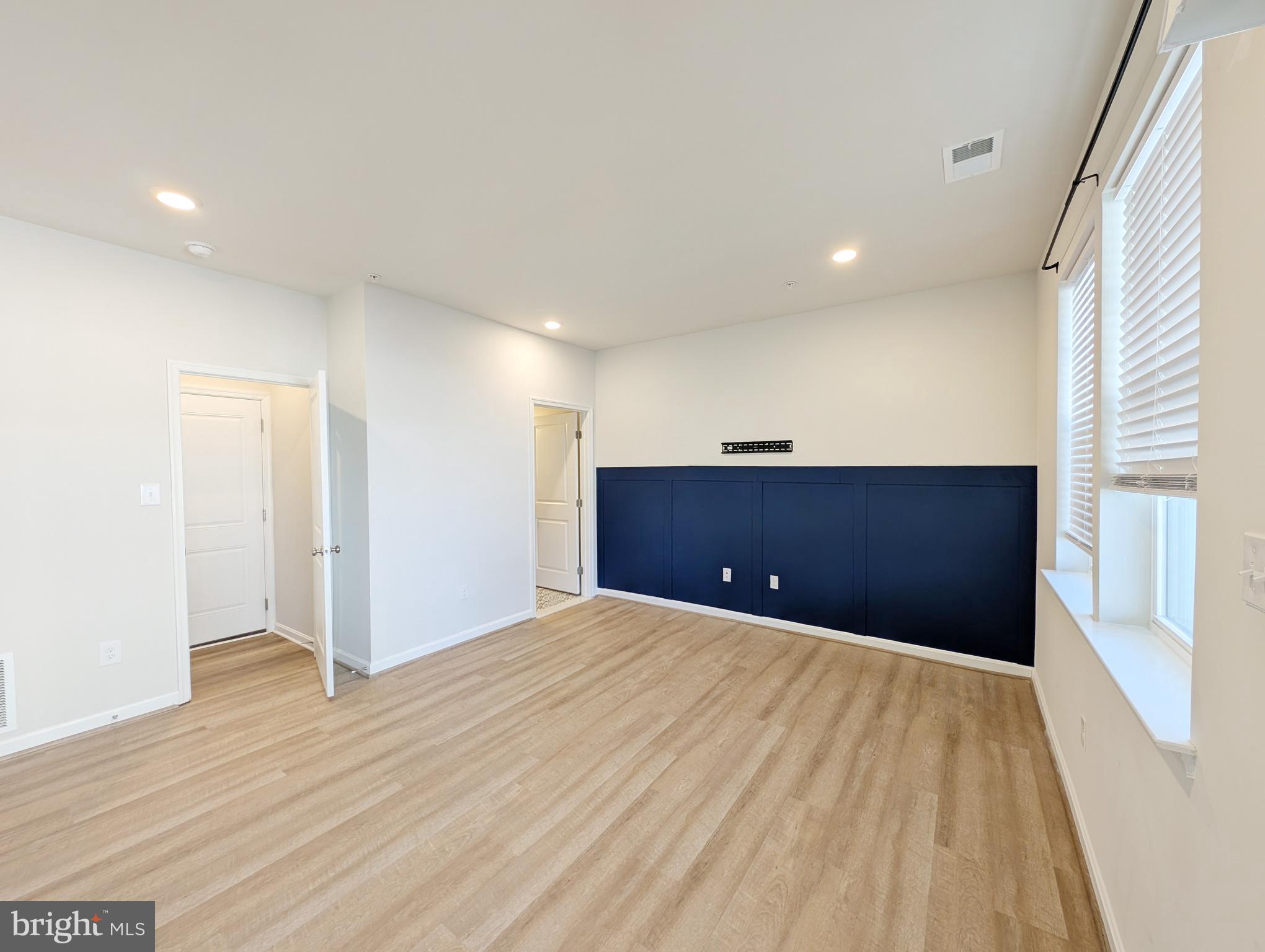 3106 Laurel Hill Road Hanover, MD 21076 - Photo 23 of 27 a view of a big room with wooden floor and cabinet