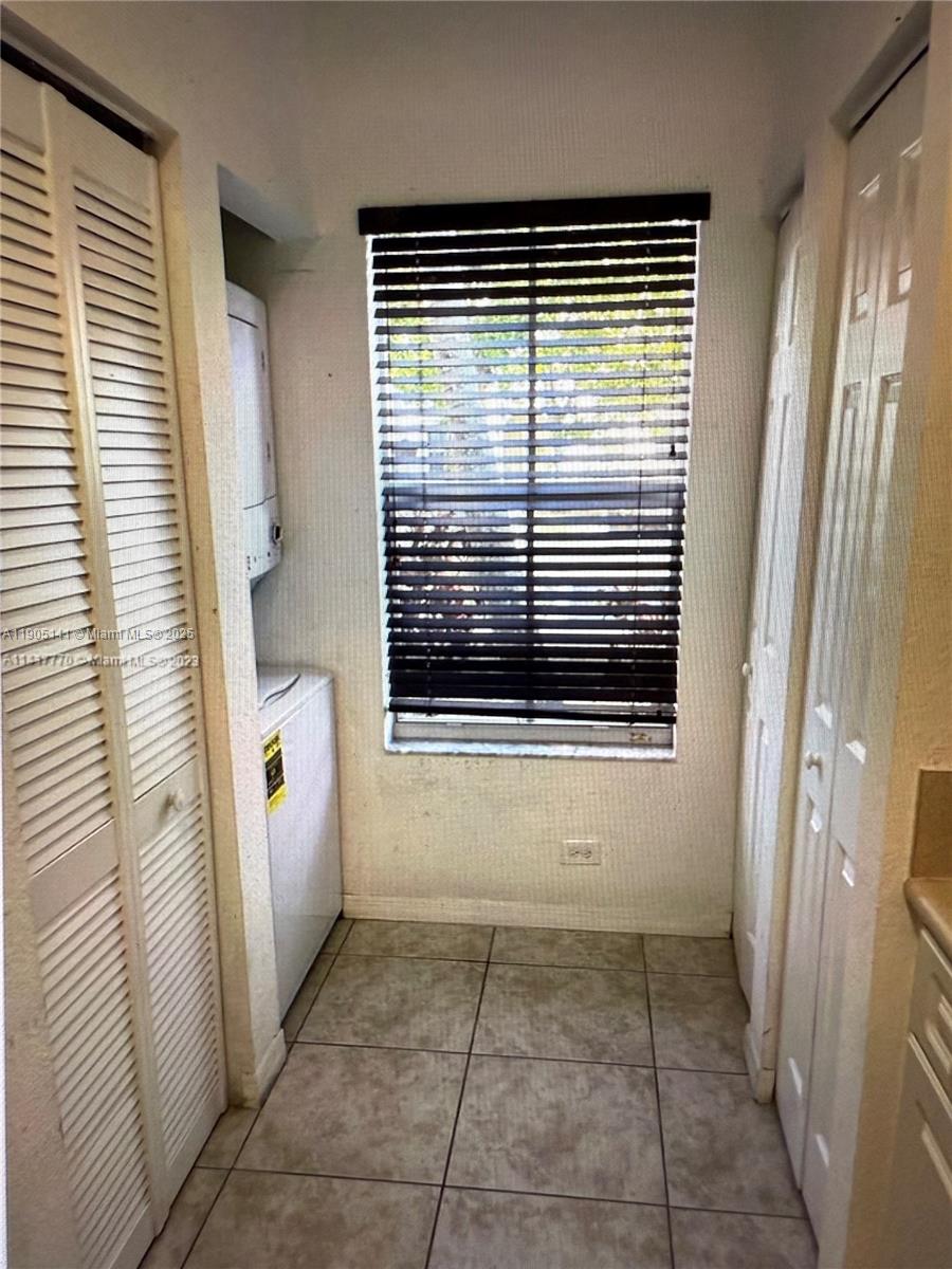4932 Southwest 140th Terrace, Unit 1 Miramar, FL 33027 - Photo 12 of 27 a view of a bathroom with a window