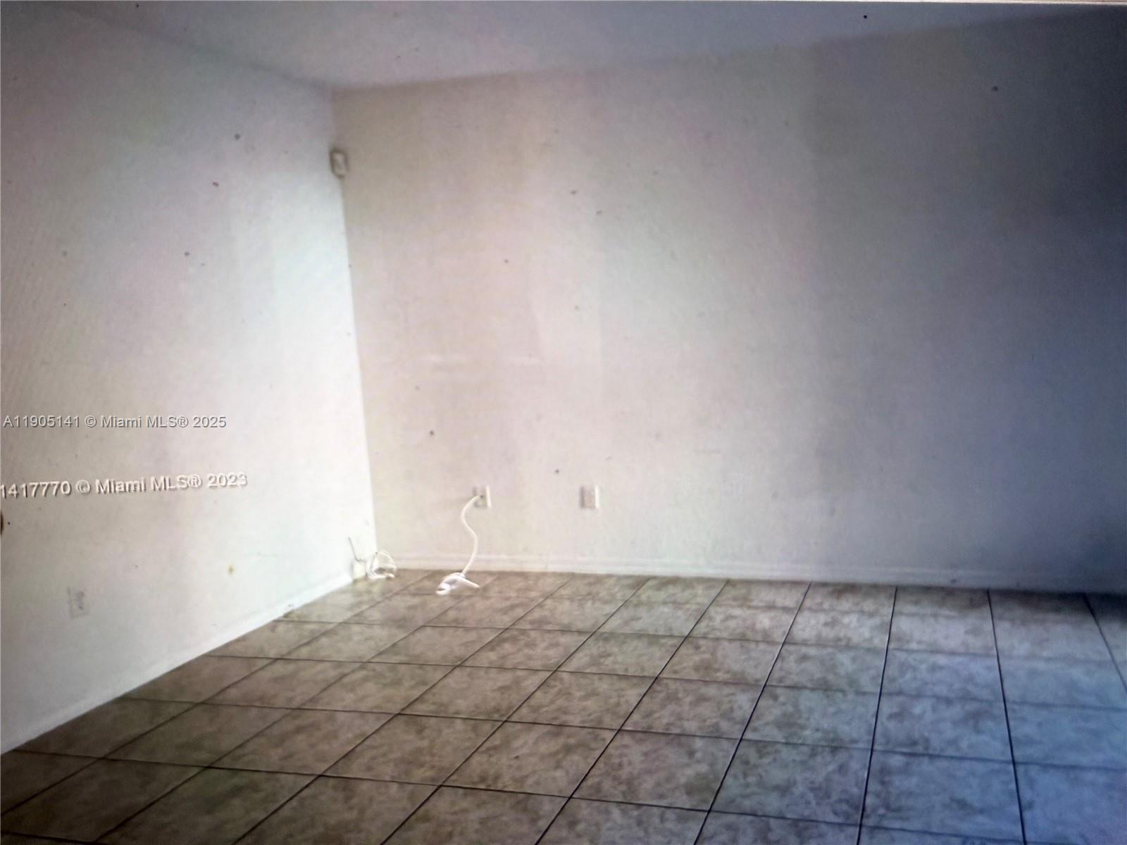 4932 Southwest 140th Terrace, Unit 1 Miramar, FL 33027 - Photo 16 of 27 a view of an empty room