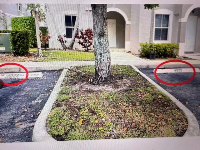 a swimming pool with outdoor seating and yard