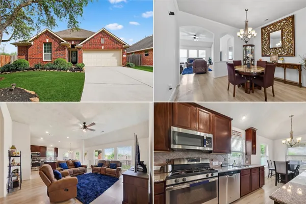 a view of living room kitchen with stainless steel appliances wooden floor and living room view