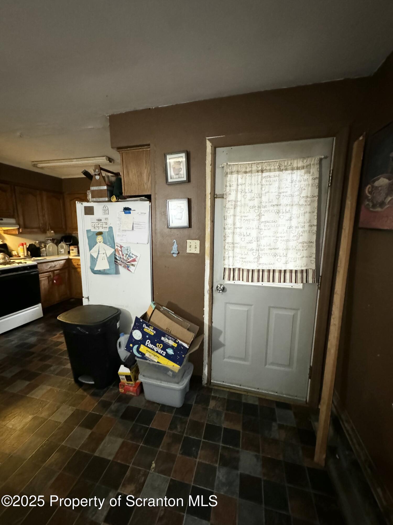 520 Charles Street Luzerne, PA 18709 - Photo 13 of 31 a living room with a couch and a table