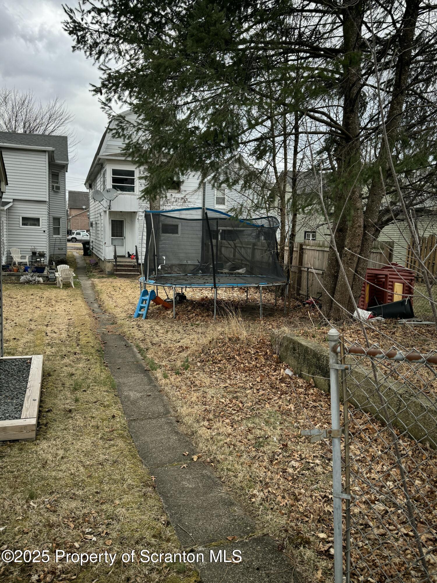 520 Charles Street Luzerne, PA 18709 - Photo 16 of 31 a backyard of a house with table and chairs