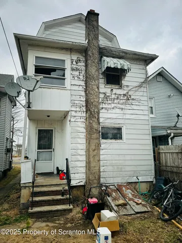 a bed room with a bed and a table