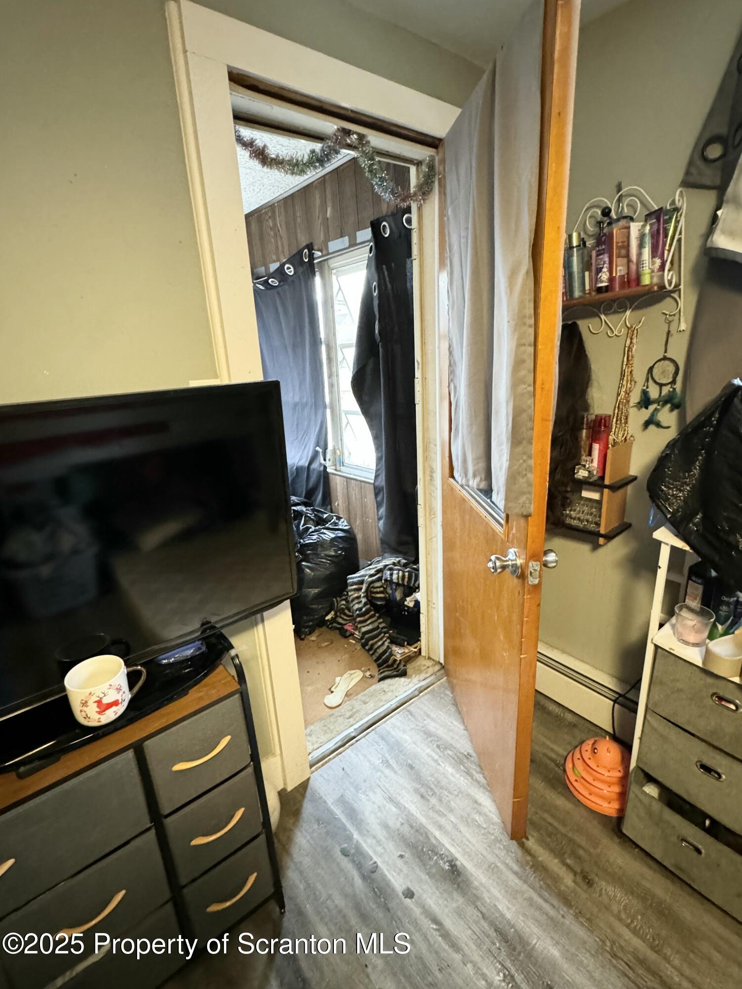 520 Charles Street Luzerne, PA 18709 - Photo 21 of 31 a view of a living room with wooden floor