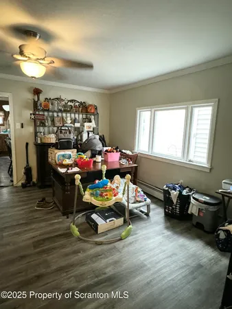 a room with furniture and a wooden floor