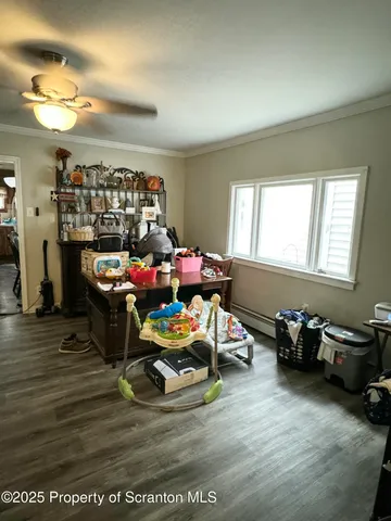 a room with furniture and a wooden floor