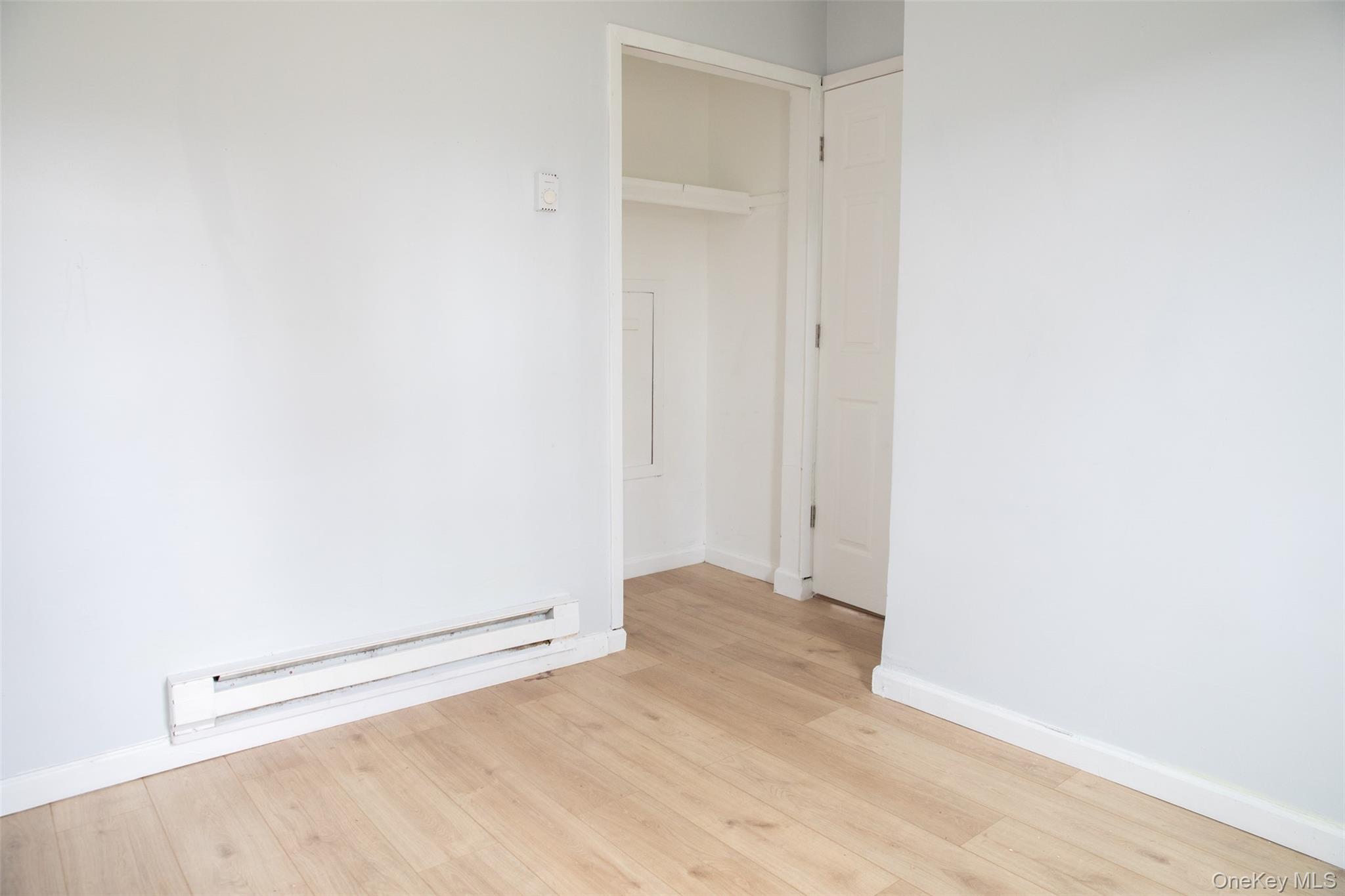 1 A Jamestown Court Ridge, NY 11961 - Photo 7 of 15 a view of an empty room