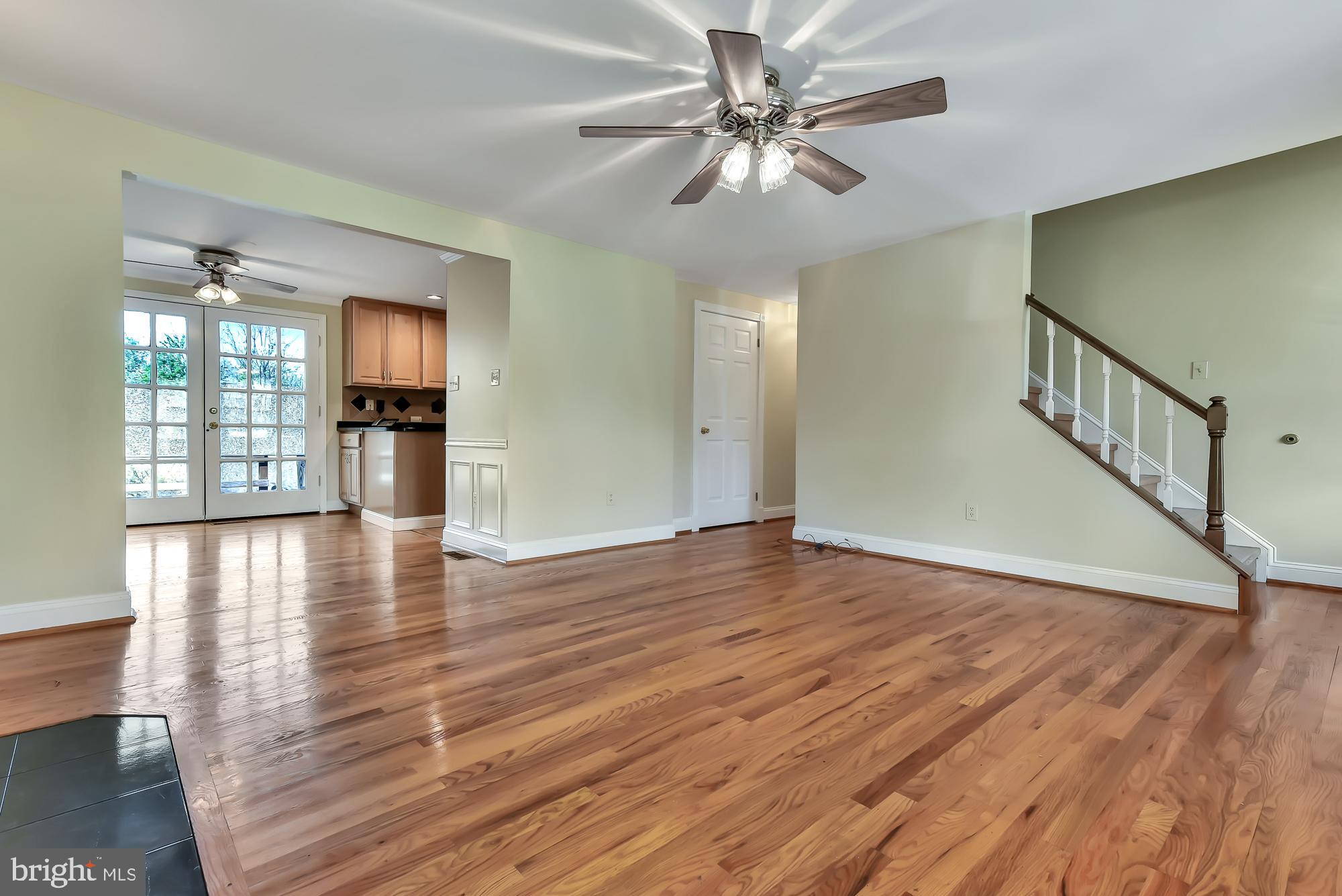 19052 Staleybridge Road Germantown, MD 20876 - Photo 15 of 49 Large family room leads to kitchen