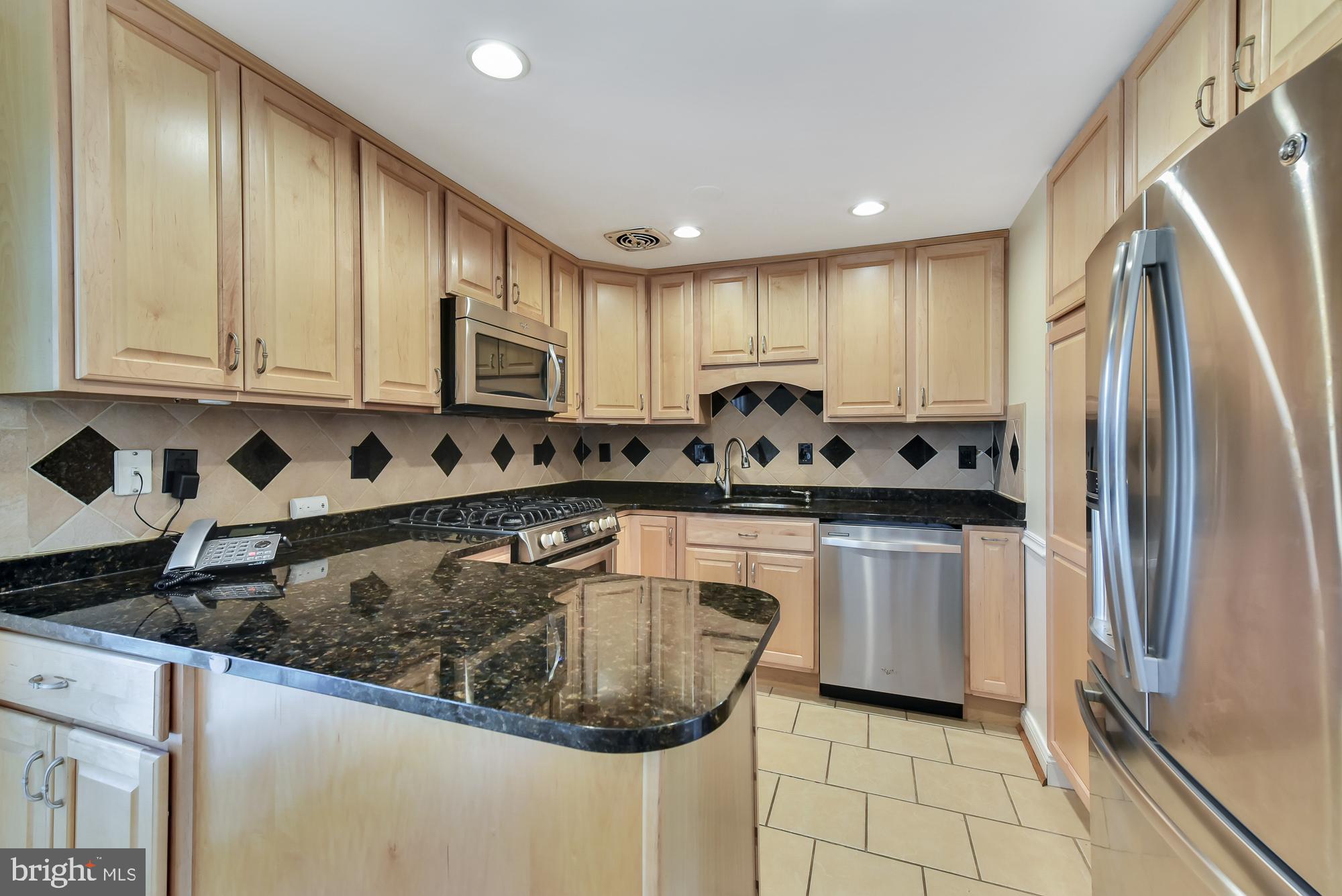 19052 Staleybridge Road Germantown, MD 20876 - Photo 24 of 49 Stainless steel appliances