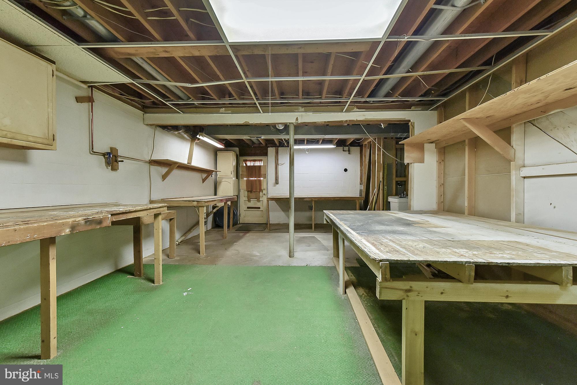 19052 Staleybridge Road Germantown, MD 20876 - Photo 41 of 49 Three huge work benches for all your projects!