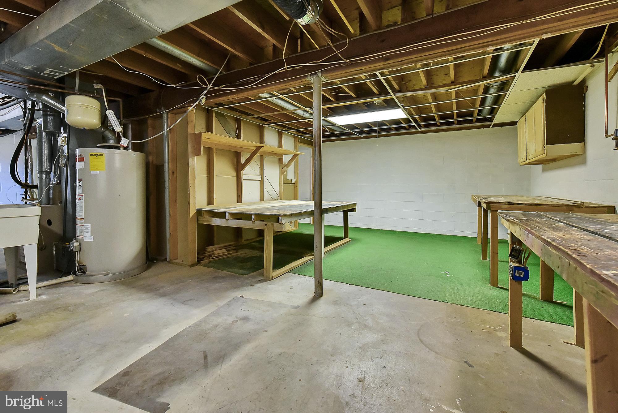 19052 Staleybridge Road Germantown, MD 20876 - Photo 42 of 49 Three huge work benches for all your projects!