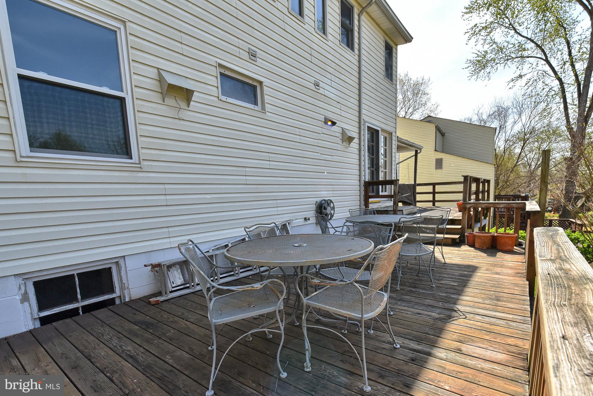 19052 Staleybridge Road Germantown, MD 20876 - Photo 44 of 49 Deck on the back of the house