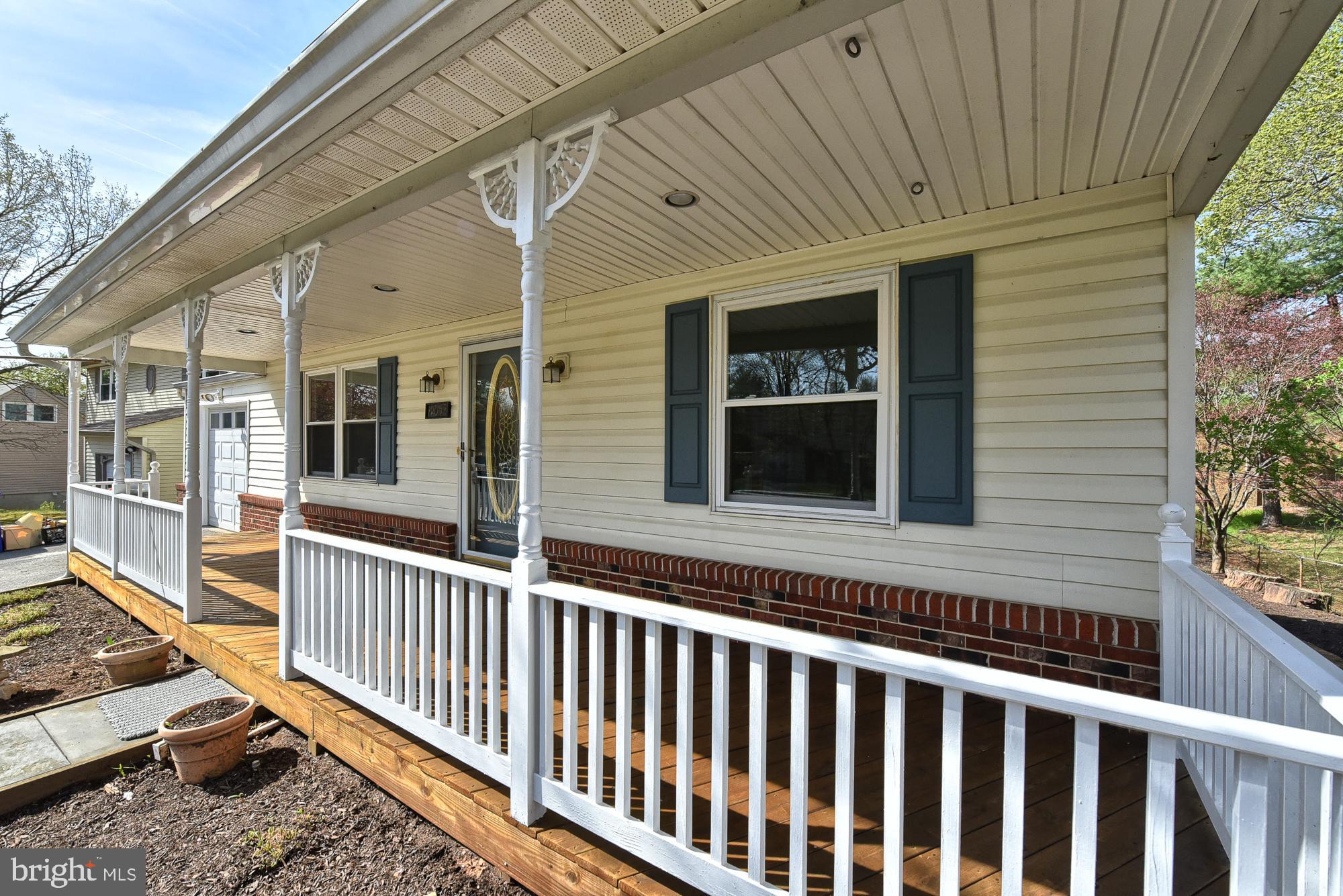 19052 Staleybridge Road Germantown, MD 20876 - Photo 9 of 49 Front porch runs the length of the house
