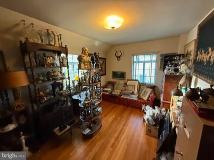 a kitchen with stainless steel appliances a stove a refrigerator and cabinets