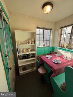 a room with furniture and a window