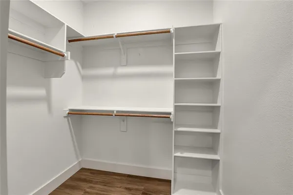 a view of an empty walk in closet