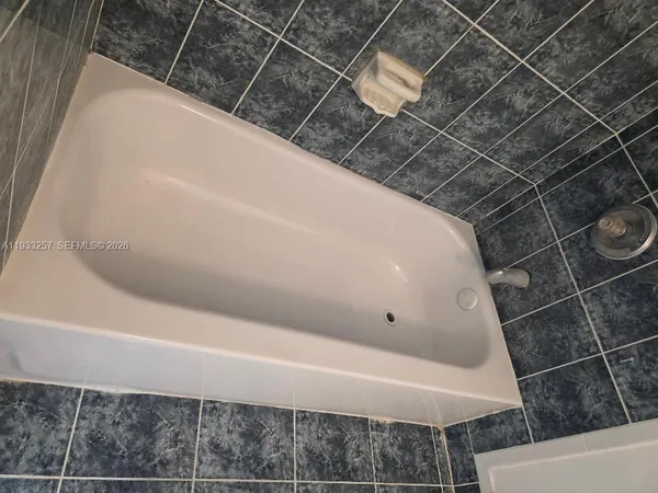 a bathroom with a bathtub