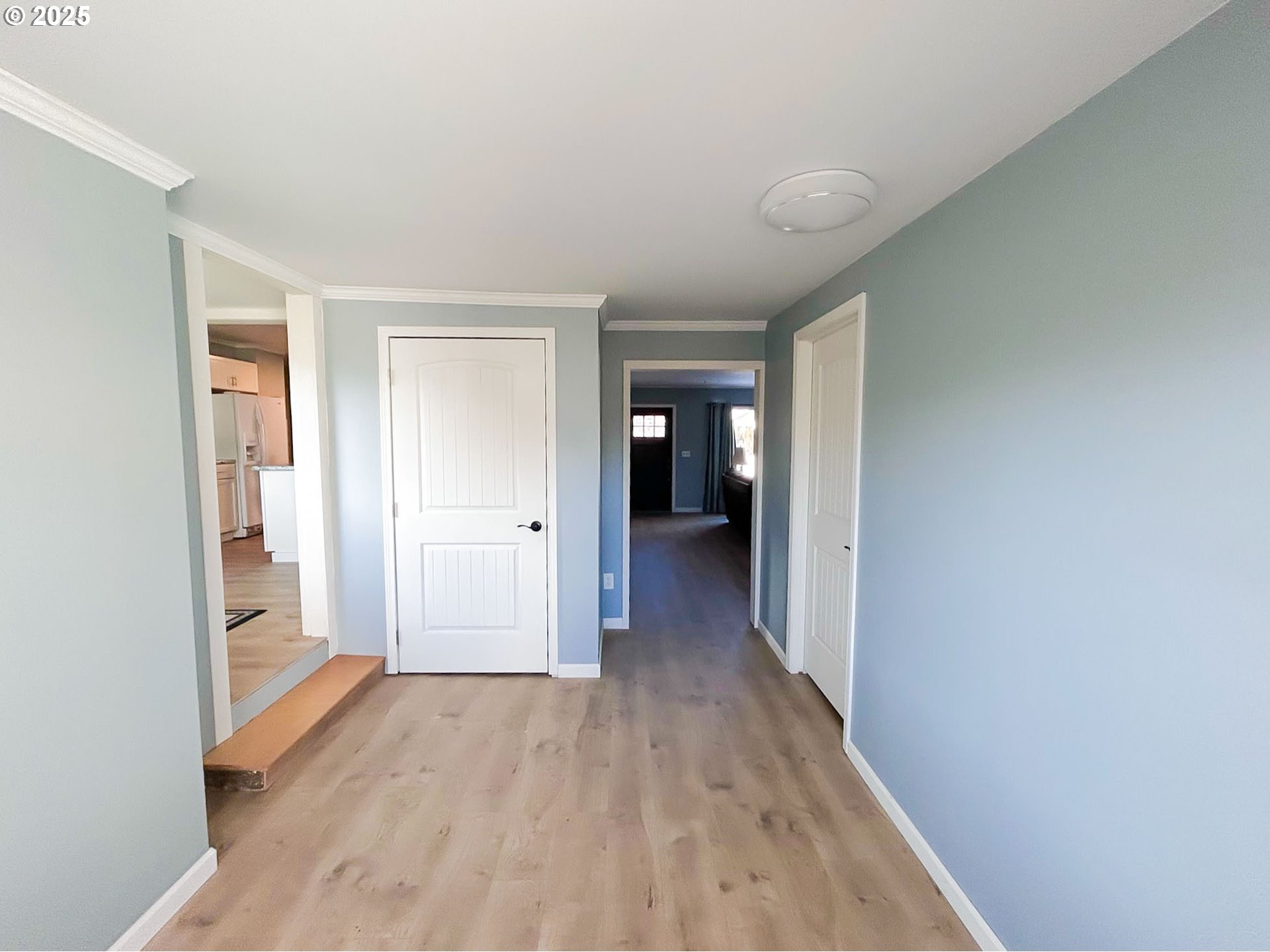 1925 Myrtle Street Baker City, OR 97814 - Photo 17 of 31 a view of a hallway with wooden floor and closet area