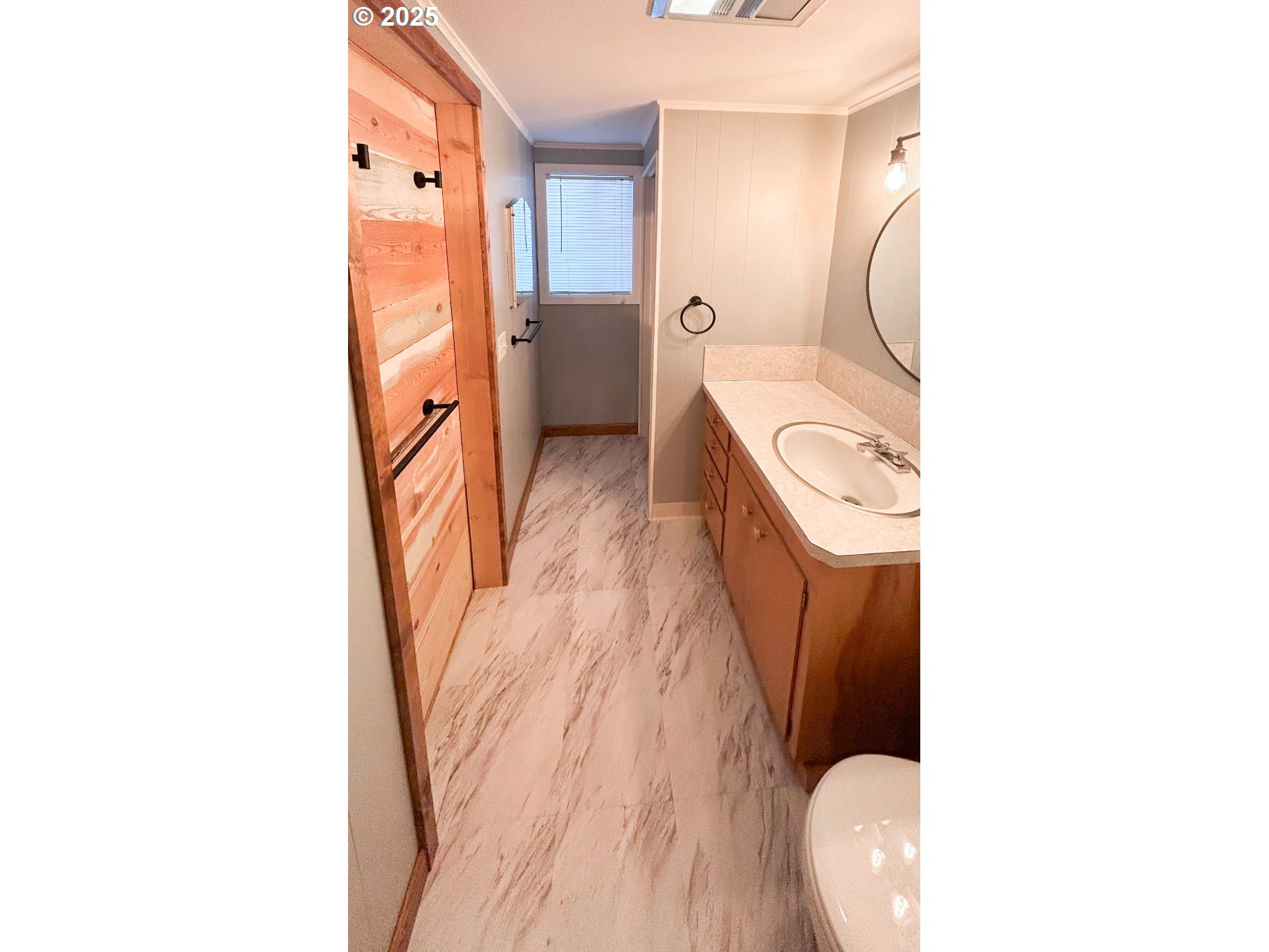1925 Myrtle Street Baker City, OR 97814 - Photo 20 of 31 a bathroom with a sink and a mirror
