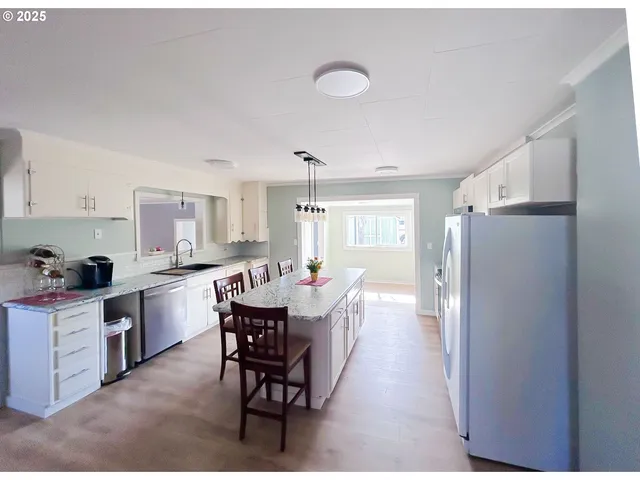 a view of a dining room with furniture