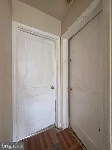 a view of small space with wooden floor