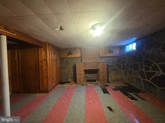 a spacious bathroom with a tub and a shower