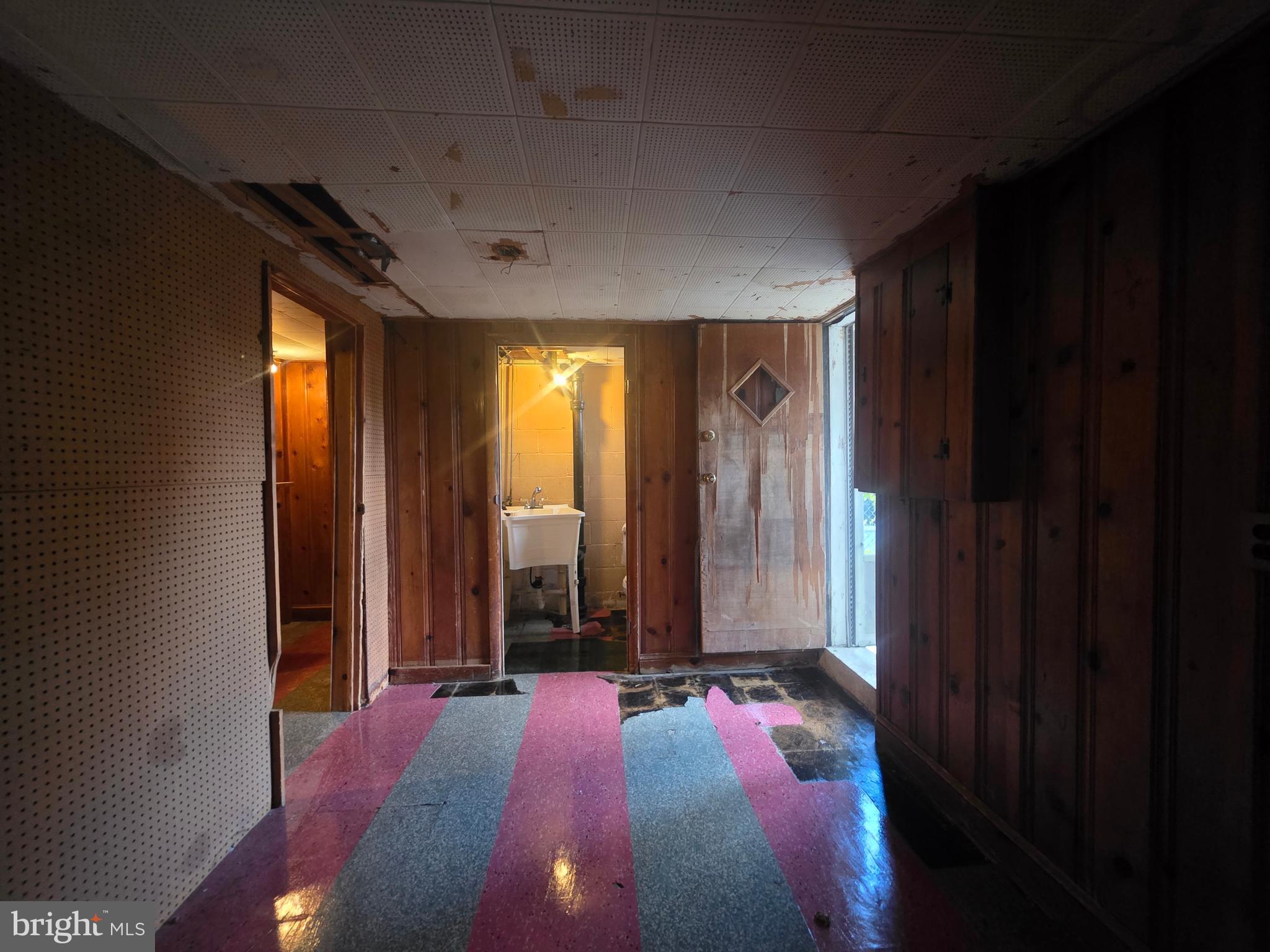 5933 Leith Walk Baltimore, MD 21239 - Photo 27 of 28 a spacious bedroom with a bed and a window