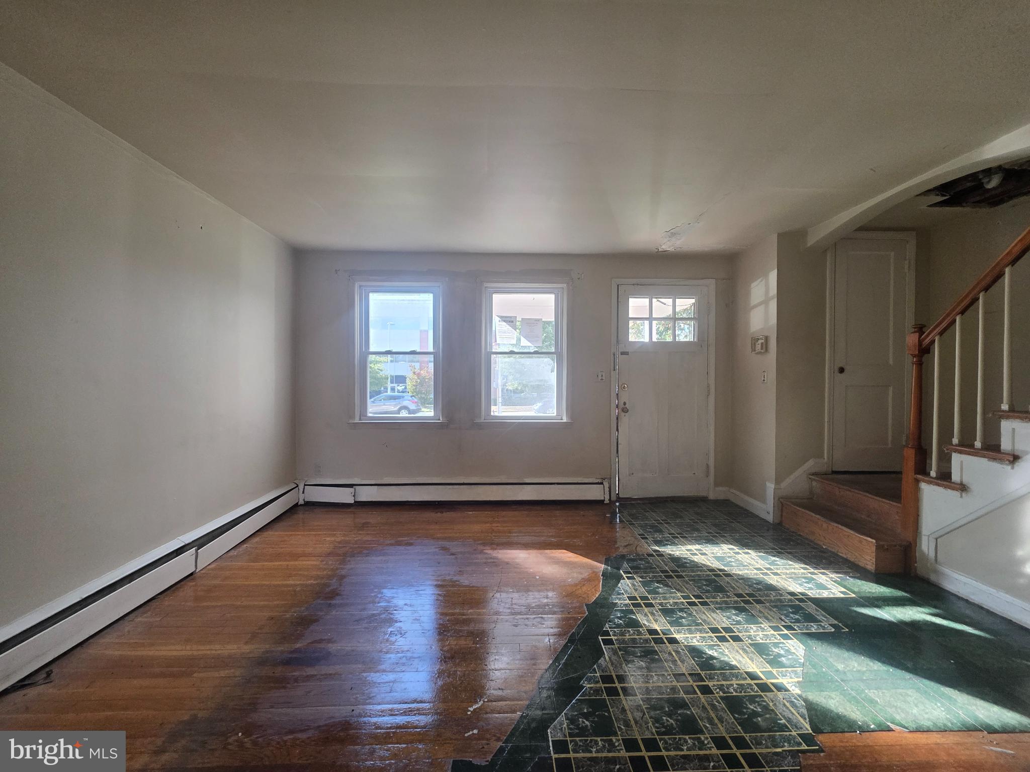 5933 Leith Walk Baltimore, MD 21239 - Photo 4 of 28 a view of an empty room and window
