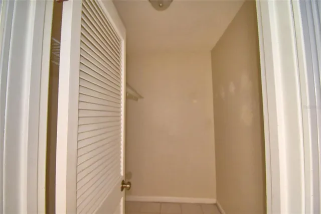 a bathroom with a tub and shower