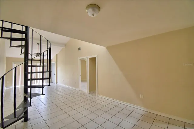 a view of entryway with stairs