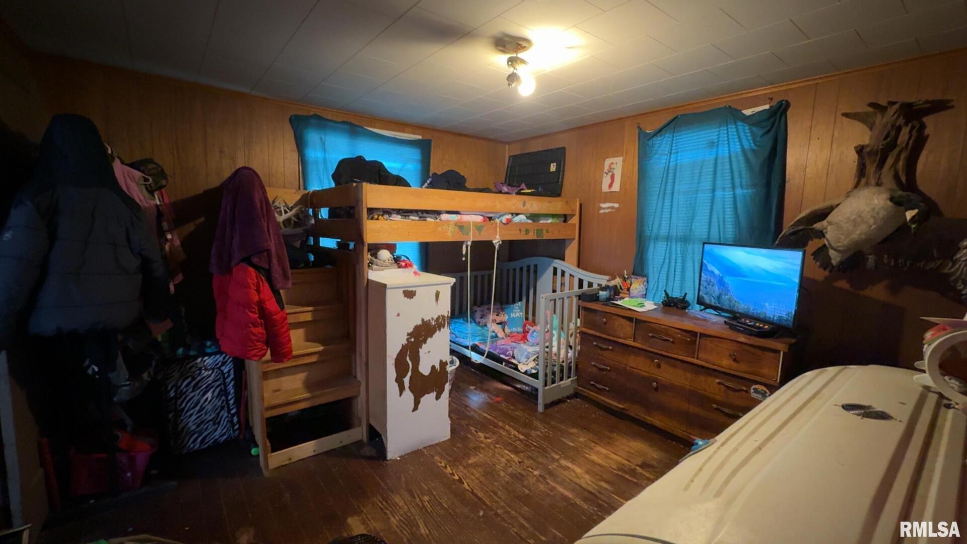 106 East North Street Sesser, IL 62884 - Photo 14 of 17 a bed room with a bed and a chair