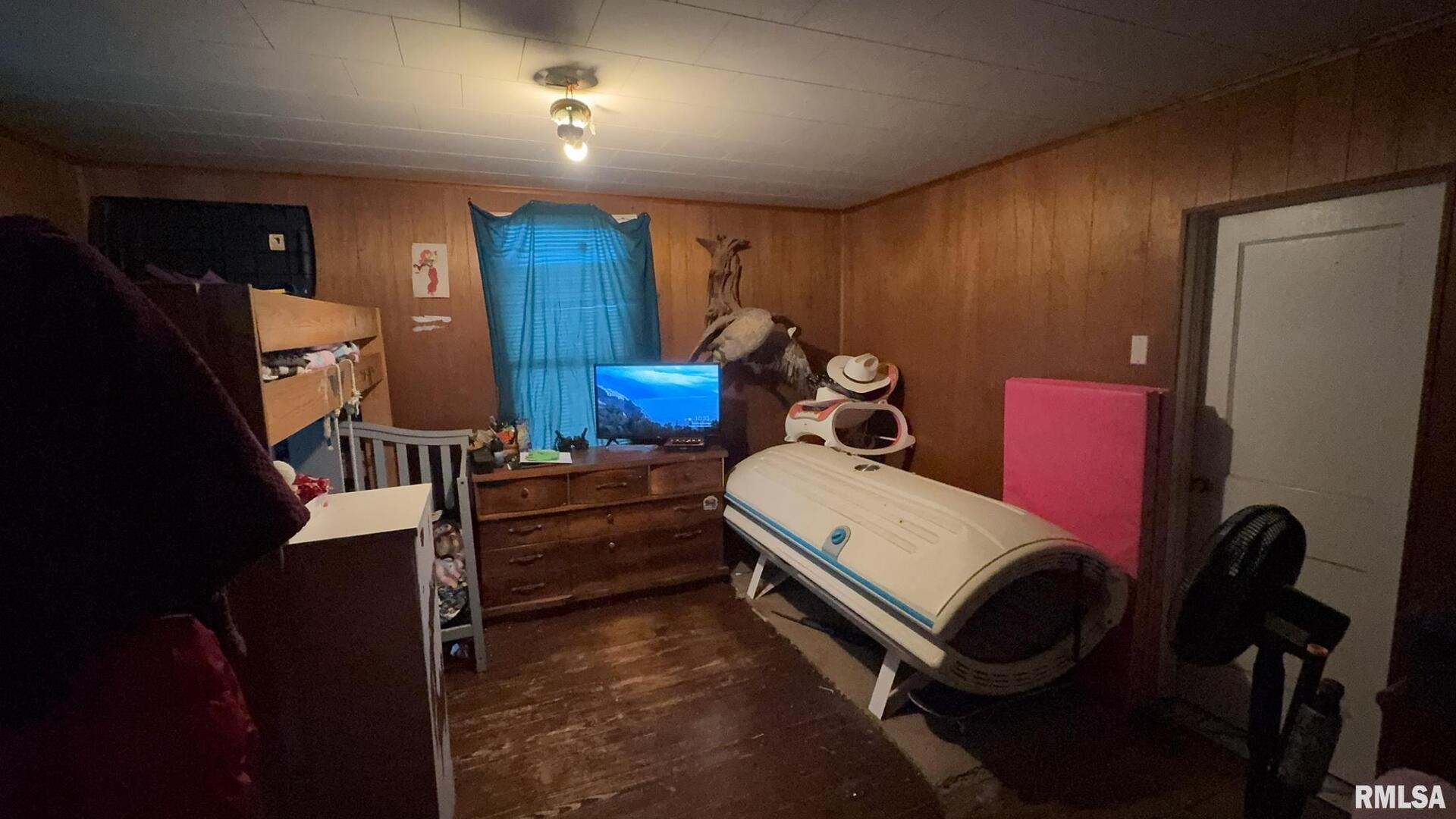 106 East North Street Sesser, IL 62884 - Photo 15 of 17 a bed room with a bed and furniture