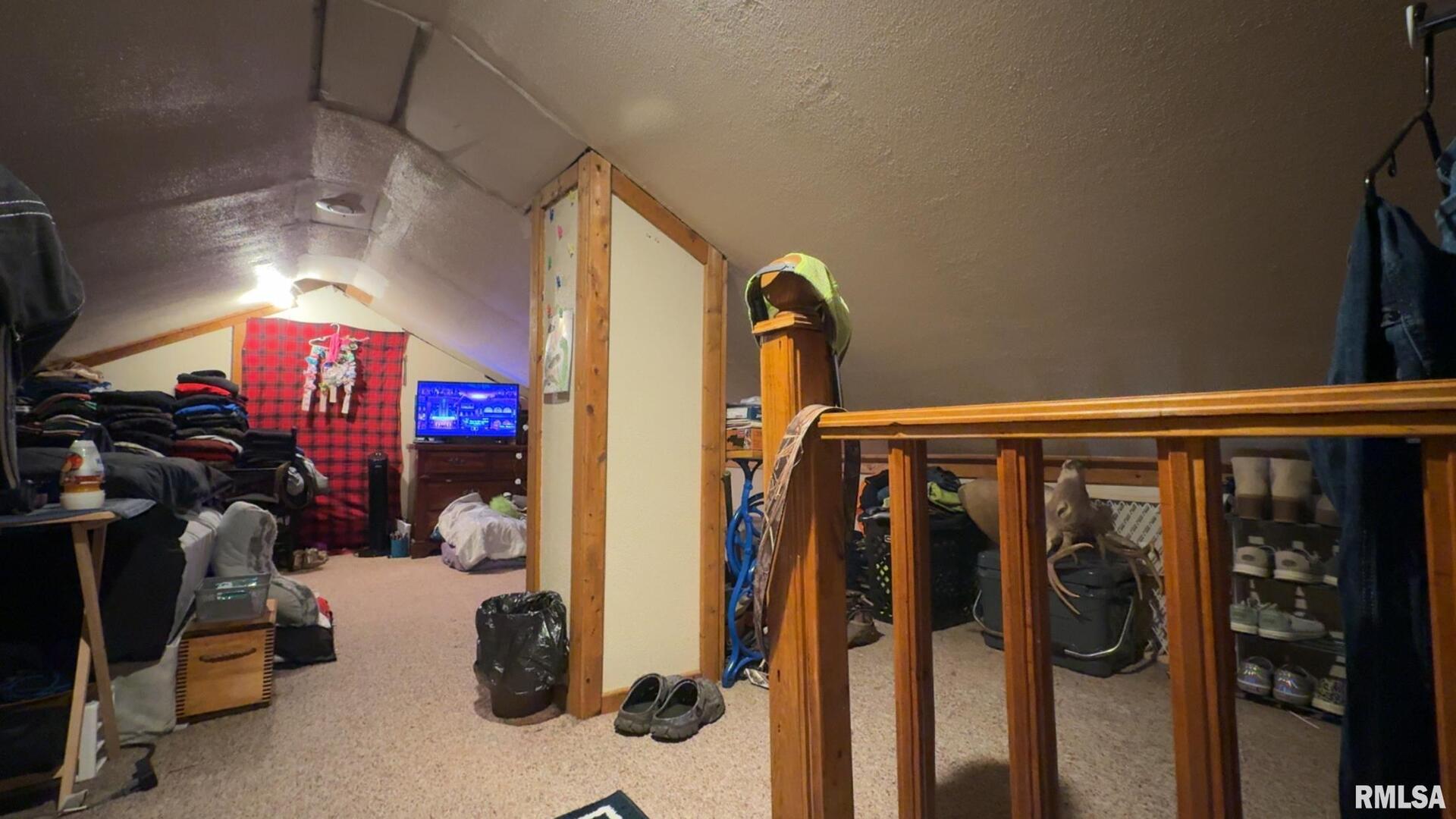 106 East North Street Sesser, IL 62884 - Photo 17 of 17 a view of walk in closet with clothes and shoes