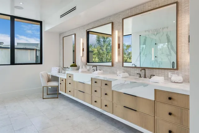 a bathroom with a bathtub and shower